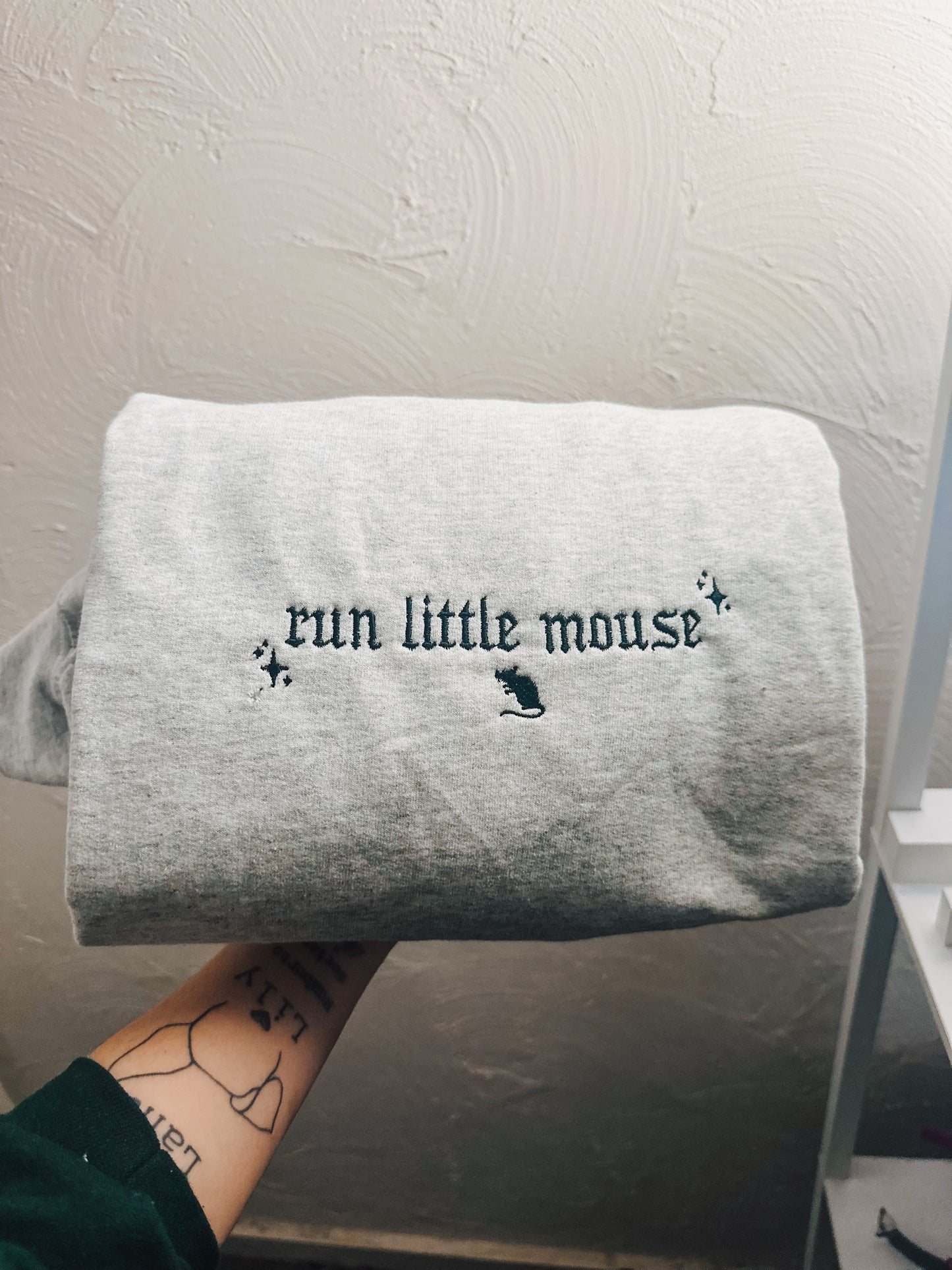 Run little embroidered crewneck